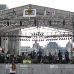 Ken Briggs with Paul Quigley (guitar), Paul Borello (drums), Fred Young (trumpet), Shawn Bazylewicz (trombone), Marla Briggs (vocals) and Marcus Benoit (Keys/Sax) onstage at Empire State Plaza "Food Festival".